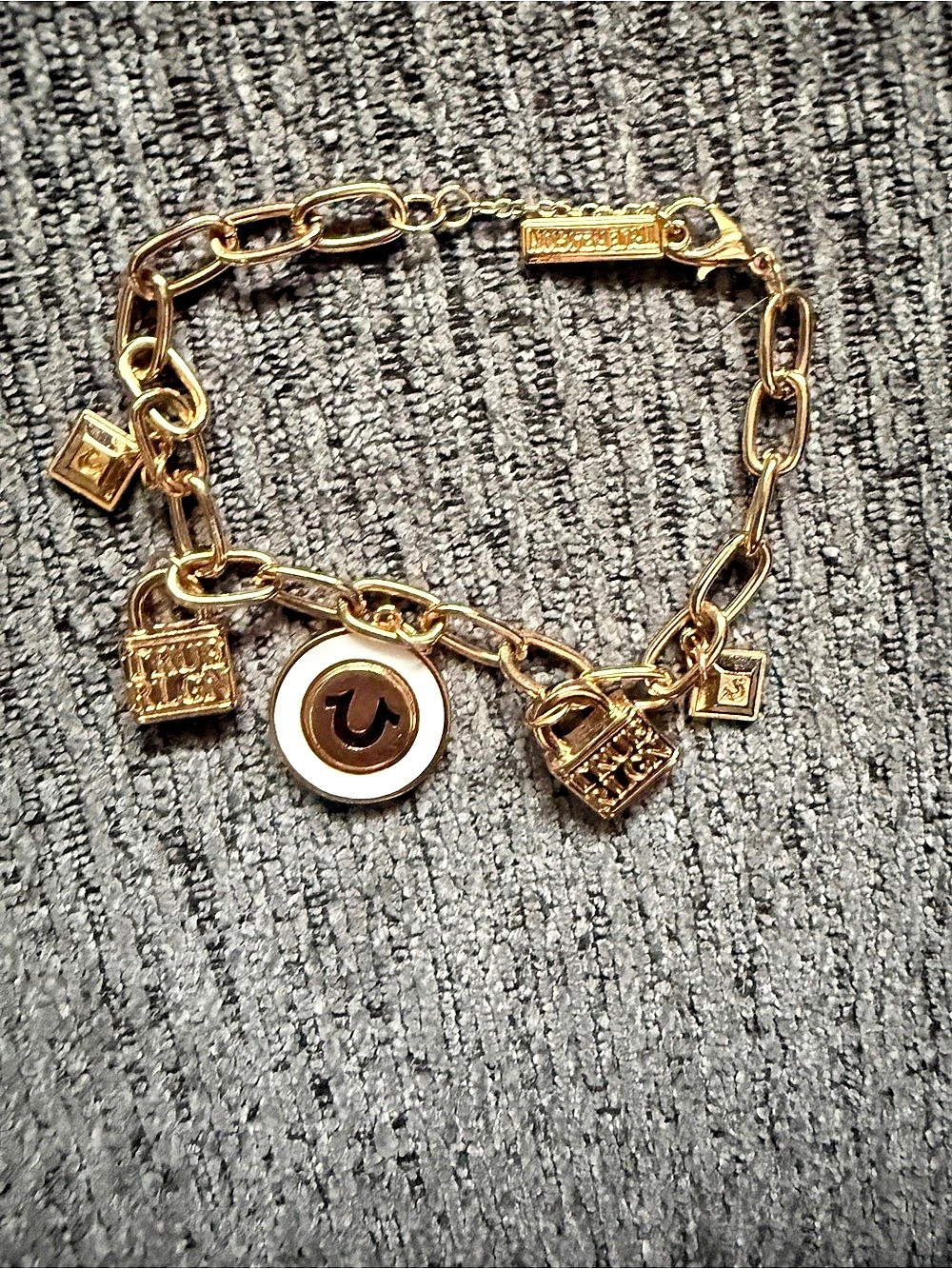 True Religion Logo Gold-Tone Charm Bracelet